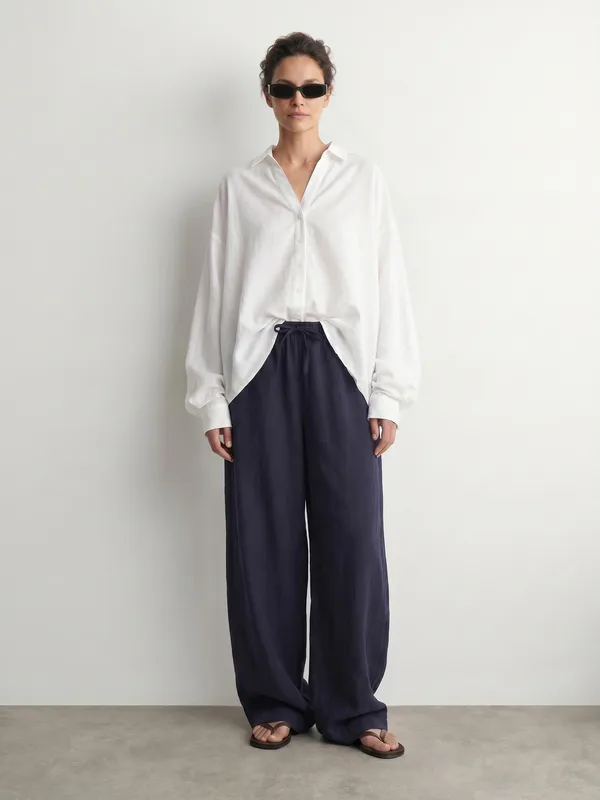 Editorial, white linen shirt, navy trousers